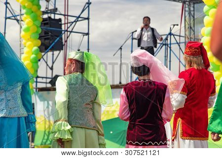 Dancing Guests And Organizers Dressed In National Costumes At The Celebration Of Sabantui