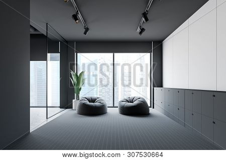 Gray And White Office Lounge With Pouffes