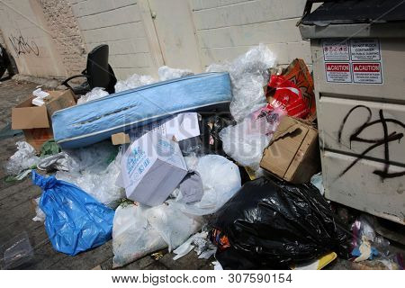6-18-2019 Los Angeles, California: Police and Government Agencies clean up and remove excess trash and refuse from a homeless encampment in Down Town Los Angeles California. Editorial Use Only.  