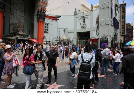 6/18/2019 Hollywood: California:  Tourist Visit Hollywood and enjoy sights, sounds, and smells of street performers and homeless alike on the streets of Hollywood in Los Angeles California. Editorial 