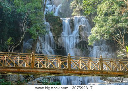 Wood Bridge Tat Kuang Si Waterfall In Laos.