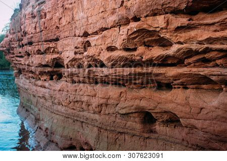 Red Natural Sand Stone On Tosna River Near Sablino, Saint Petersburg, Russia