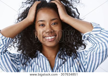 Close-up Carefree Relaxed Tender African-american Positive Girl Playing Curls Put Hands Through Hair