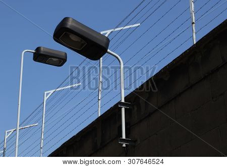 Wall With Lamps Of The Stasi Prison In Berlin