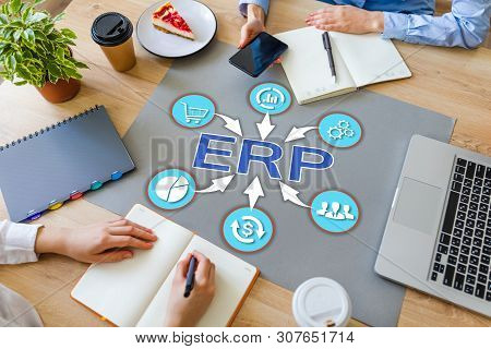 Erp Enterprise Resource Planning Business Automation Technology On Office Desktop.