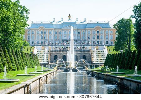 Peterhof, St Petersburg, Russia - June 06, 2019: Grand Palace And The Grand Cascade Fountains In Pet