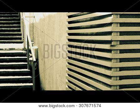 Rhythms Formed By The Staircase And Wall-mounted Front Panel.