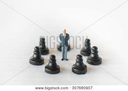 Business Work And Planning Concept. Close Up Of Businessman Miniature Figure Standing On Center Of R