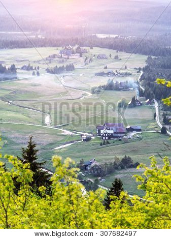 Jizerka Village At Sunset Time. View From Bukovec Mountain, Jizera Mountains, Czech Republic