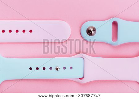 Watchband. Silicone Strap For Sports Watches. Color Bracelet For Smart Watches On Pink Background