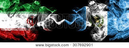 Iran Vs Guatemala, Guatemalan Smoky Mystic States Flags Placed Side By Side. Thick Colored Silky Smo