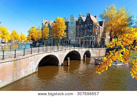 Historical Houses Of Amsterdam Over Canal Ring Landmark In Old European City, Holand Netherlands. Am