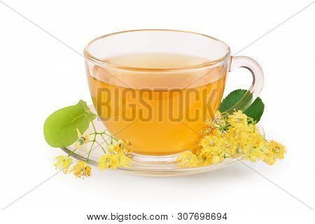 Tea From Linden Flowers In Glass Cup With Flower Clusters Of Lime Isolated On White Background