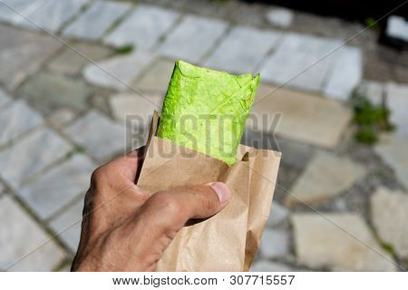 Green Pita Bread, Shaurma, Shaverma, Kebab, Doner Shawarma In Male Hand Closeup
