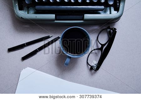 Literature, Author And Writer, Writing And Journalism Concept: Typewriter, Cup Of Coffee And Glasses