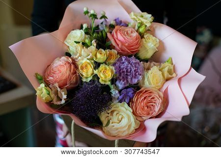 Bouquet Of Flowers On A Leg In The Interior Of The Restaurant For A Celebration Shop Floristry Or We