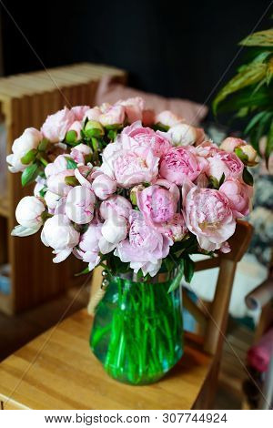 Bouquet Of Flowers On A Leg In The Interior Of The Restaurant For A Celebration Shop Floristry Or We