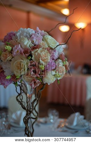 Bouquet Of Flowers On A Leg In The Interior Of The Restaurant For A Celebration Shop Floristry Or We