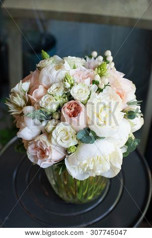 Bouquet Of Flowers On A Leg In The Interior Of The Restaurant For A Celebration Shop Floristry Or We