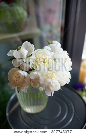 Bouquet Of Flowers On A Leg In The Interior Of The Restaurant For A Celebration Shop Floristry Or We