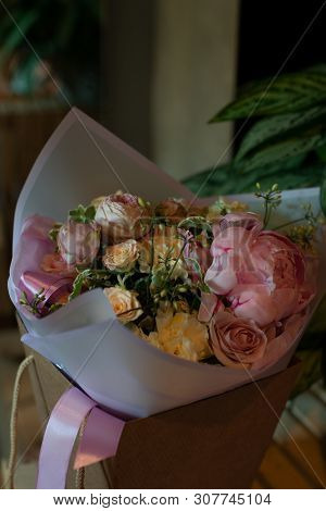 Bouquet Of Flowers On A Leg In The Interior Of The Restaurant For A Celebration Shop Floristry Or We