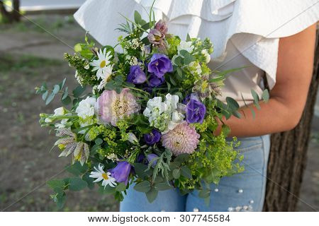 Bouquet Of Flowers On A Leg In The Interior Of The Restaurant For A Celebration Shop Floristry Or We