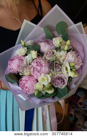 Bouquet Of Flowers On A Leg In The Interior Of The Restaurant For A Celebration Shop Floristry Or We