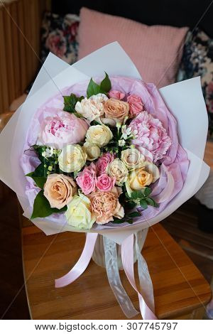 Bouquet Of Flowers On A Leg In The Interior Of The Restaurant For A Celebration Shop Floristry Or We