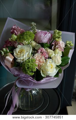 Bouquet Of Flowers On A Leg In The Interior Of The Restaurant For A Celebration Shop Floristry Or We