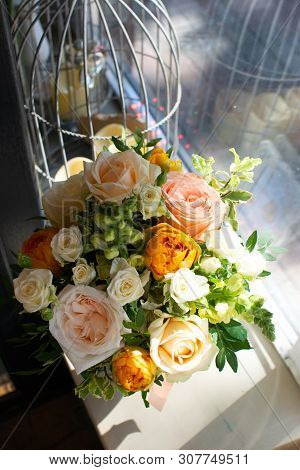 Bouquet Of Flowers On A Leg In The Interior Of The Restaurant For A Celebration Shop Floristry Or We