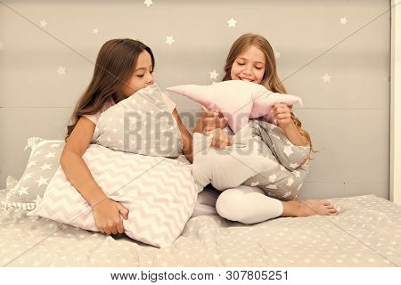 Girls Happy Friends With Cute Pillows. Pillow Fight Pajama Party. Sleepover Time For Pillow Fight. D