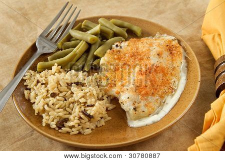Tilapia Parmesan måltid