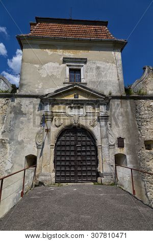 Ancient Historical Fortified Svirz ( Svirzh ) Castle At A Summer Day Against The Blue Sky And White 