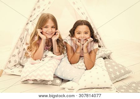 Girls Having Fun Tipi House. Girlish Leisure. Sisters Share Gossips Having Fun At Home. Pajamas Part