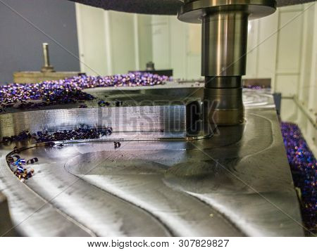 A Process Of Cnc Milling Of Lagre Thick Steel Palte By Curved Trajectory, Selective Focus With Blur 