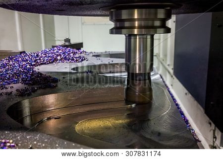 A Process Of Cnc Milling Of Lagre Thick Steel Palte By Curved Trajectory, Selective Focus With Blur 