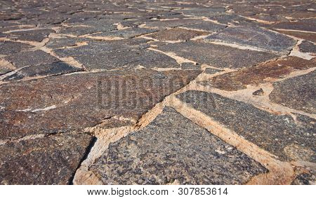Low Wide-angle View Of Textured Crazy Paving Mosaic Floor