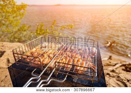 Chiken On The Grill Against The Background Of The Sea And The Beach- Paleo Food Photography.deliciou