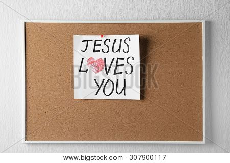 Cork Board With Paper And Written Text Jesus Loves You On White Background