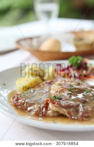 Saltimbocca Pork Steak On A Place In Closeup