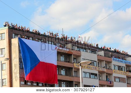 Prague, Czech Republic - June 23 2019: People On A Roof Of A Building Supporting Protests Against Pr