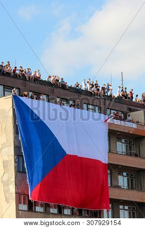 Prague, Czech Republic - June 23 2019: People On A Roof Of A Building Supporting Protests Against Pr