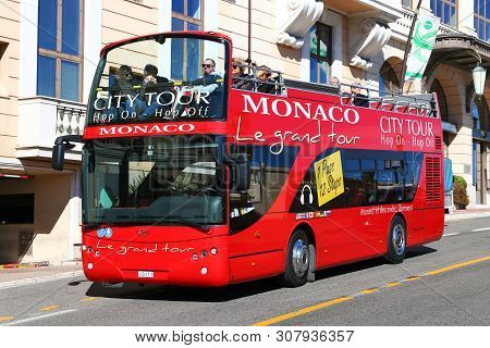 Monte-carlo, Monaco - March 12, 2019: Red Sightseeing Bus Ayats Bravo I In The City Street.