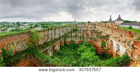 Ancient Medzhybizh Fortress Of The 14-16th Centuries. Picturesque Ruins Of The Brick Fortress Palace