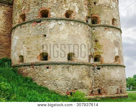 Ancient Stone And Brick Medzhybizh Fortress Of The 14-16th Centuries. Bottom Part Of The Angular Eas