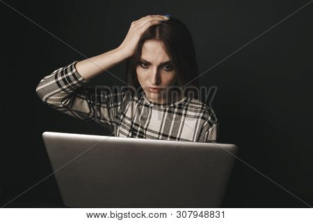 Teen Girl Excessively Sitting At The Computer Laptop At Home. He Is A Victim Of Online Bullying Stal