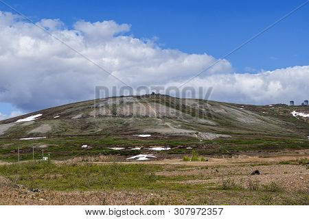 A Distant View Of Anvil Mountain In Nome Alaska.