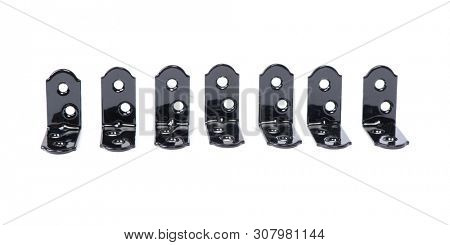 Group of  black metallic angle fixators. Mounting metal angle corners brackets isolated on white background