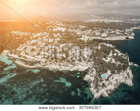 Beautiful birdeye view on the sea coastline with pier and yakhts at sunny day. Travell, jorney,islands, Seascape, freedom, holidays concept.