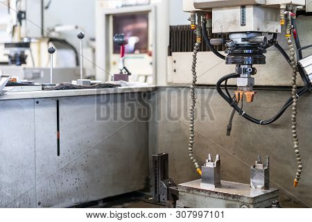 Close Up Copper Work Piece And Electrode During Setup On Automatic Electrical Discharge Machine (edm